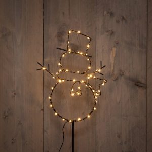 Snjókarl svartur, hvítt ljós - úti